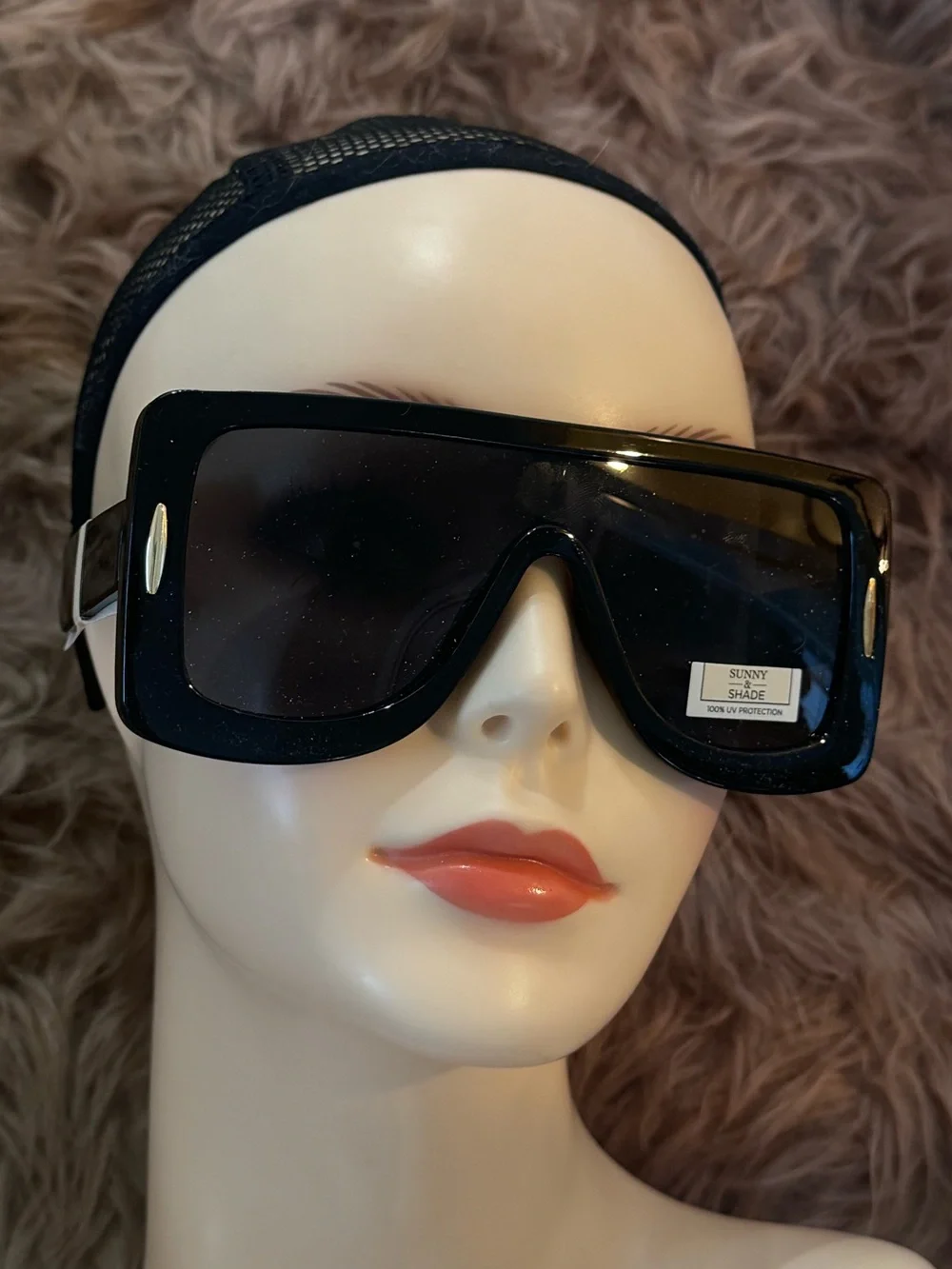 Futuristic sunglasses with gold details